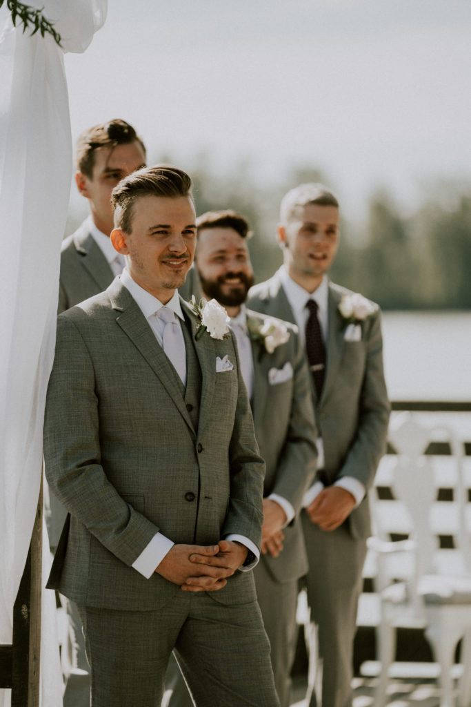 groom waiting at ceremony